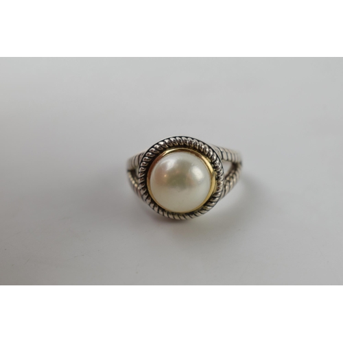 616 - Silver and 14ct gold ring set with a large pearl, with textured band, size O/P, total weight 7 grams... 