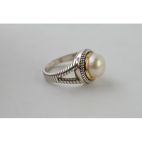 616 - Silver and 14ct gold ring set with a large pearl, with textured band, size O/P, total weight 7 grams... 