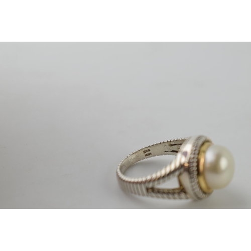 616 - Silver and 14ct gold ring set with a large pearl, with textured band, size O/P, total weight 7 grams... 