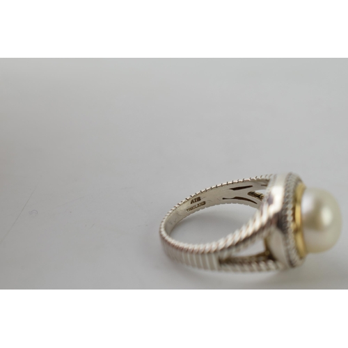 616 - Silver and 14ct gold ring set with a large pearl, with textured band, size O/P, total weight 7 grams... 