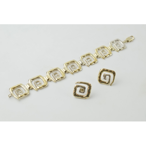 631 - Sterling silver gilt designer bracelet with matching earrings, 32.9 grams, in the style of Peter Nic... 