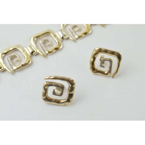 631 - Sterling silver gilt designer bracelet with matching earrings, 32.9 grams, in the style of Peter Nic... 