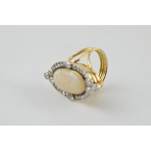 632 - Art Nouveau 18ct gold marquise ring set with 1ct old cut diamonds and a 17x10mm grey / black opal, t... 