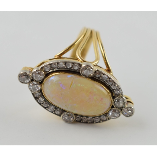 632 - Art Nouveau 18ct gold marquise ring set with 1ct old cut diamonds and a 17x10mm grey / black opal, t... 