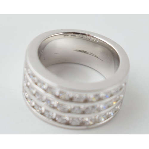 635 - 950 platinum ring set with 1.8ct F/G US2 diamonds, size I.