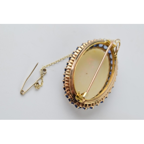 636 - Edwardian 14ct gold opal and sapphire brooch, 33x19mm opal with circa 6ct of sapphires, 40mm wide, w... 