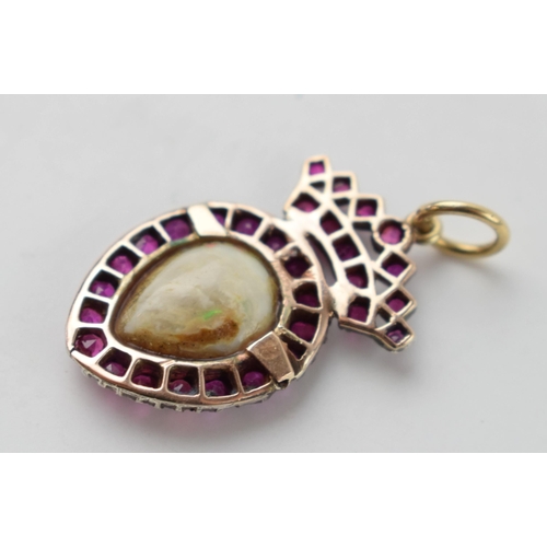 637 - Victorian pendant set with ruby and black pear cut opal, 9ct gold and silver, 25mm tall, 1.7 grams.