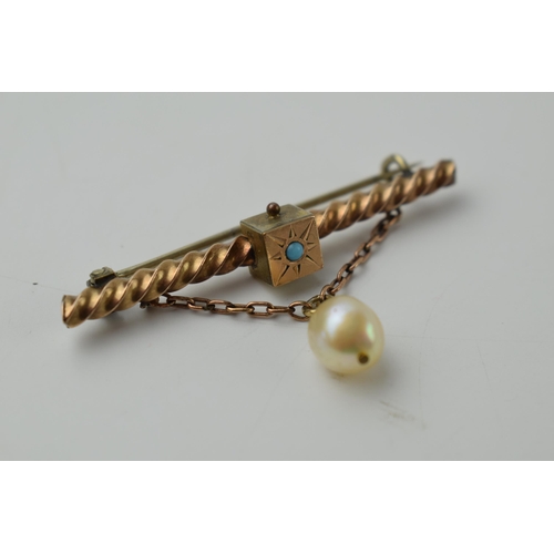 647 - Edwardian 9ct gold scroll bar brooch set with turqouise and drop pearl, steel pin, 4.7 grams.