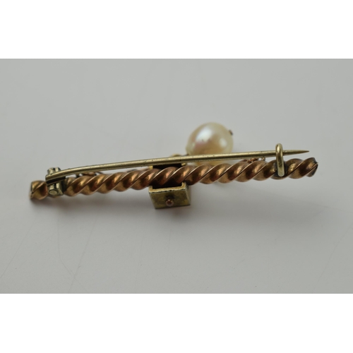 647 - Edwardian 9ct gold scroll bar brooch set with turqouise and drop pearl, steel pin, 4.7 grams.