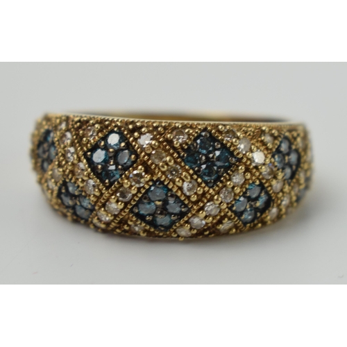 655 - 9ct gold ring set with diamonds and pale blue stones, 3.9 grams, size Q.