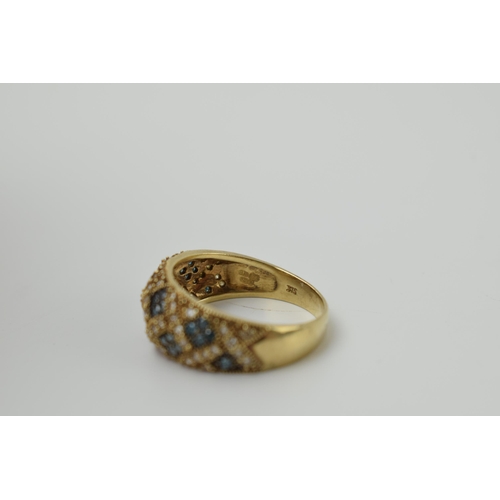 655 - 9ct gold ring set with diamonds and pale blue stones, 3.9 grams, size Q.