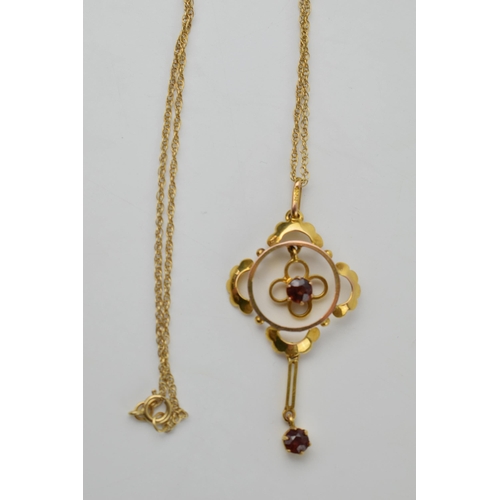 658 - 9ct gold garnet dropper pendant on 9ct gold chain, 2.4 grams, chain 45cm long.