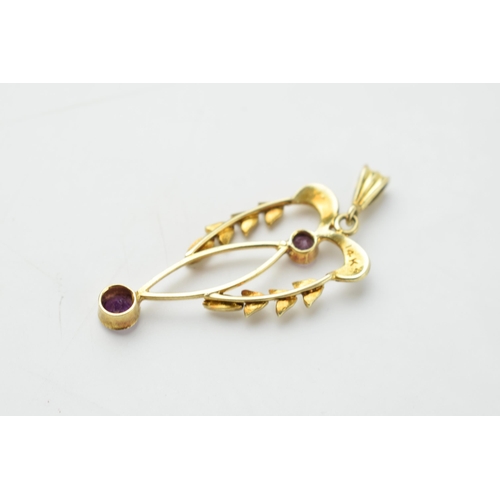 661 - Edwardian 14ct gold pendant set with amethysts and seed pearls, 4cm long, 2.2 grams.