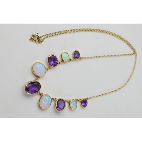 662 - 9ct gold amethyst and opal necklace set with 5 graduated amethysts and 4 graduated opals, 10.6 grams... 