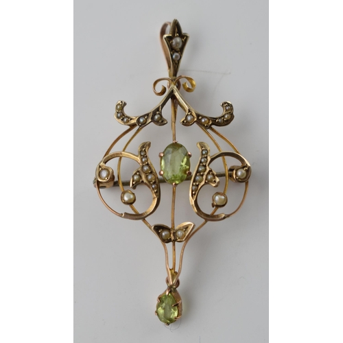 663 - 9ct gold Art Nouveau peridot and seed pearl pendant / brooch, 5.5cm tall, 3.4 grams.