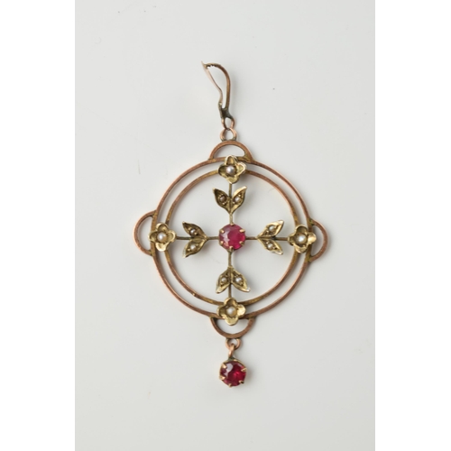 664 - 9ct gold pendant set with seed pearls and red stones, 2.2 grams.