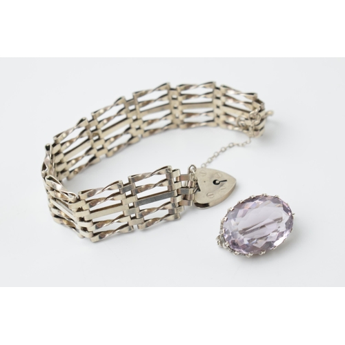 666 - Silver gate bracelet, 18.9 grams, with a purple stone silver brooch, 5.1 grams (2).