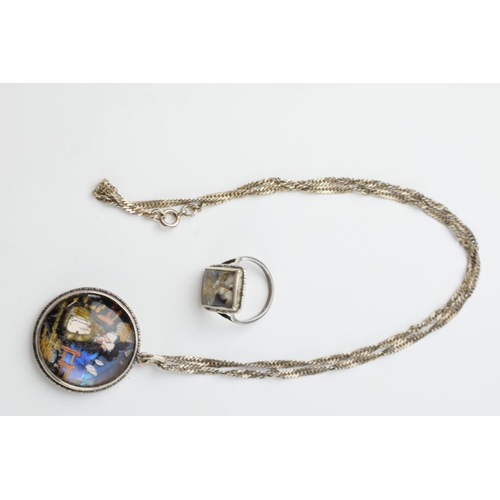 668 - Silver chain with silver pendant with butterfly wing decoration of a girl with a similar ring, 13.2 ... 