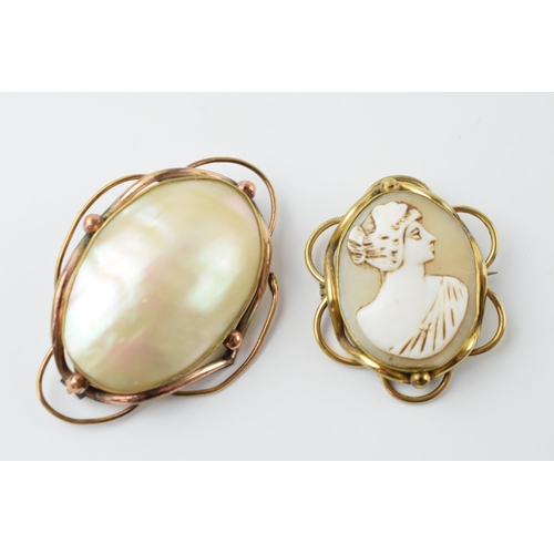 669 - Victorian pinchbeck and Mother of Pearl brooch with a cameo brooch (2), largest 7cm diameter (2).