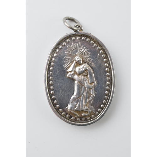 670 - French silver locket depicting a religious figure, 11.1 grams.