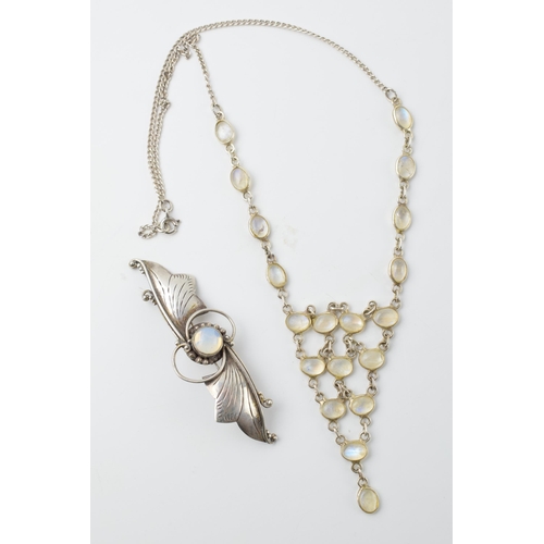 679 - Silver and moonstone necklace with matching brooch, 13.4 grams, chain 41cm long.