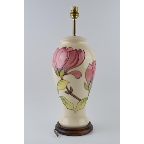 112 - Large Moorcroft lamp base with pink floral pattern on a magnolia background, 35cm tall exc. brass fi... 