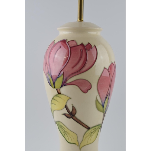 112 - Large Moorcroft lamp base with pink floral pattern on a magnolia background, 35cm tall exc. brass fi... 