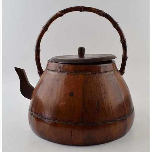 175 - Large vintage Chinese tea kettle in wood with bamboo handle. A good decorative item. Width 37cm, Hei... 