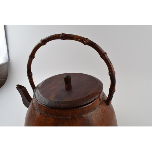 175 - Large vintage Chinese tea kettle in wood with bamboo handle. A good decorative item. Width 37cm, Hei... 