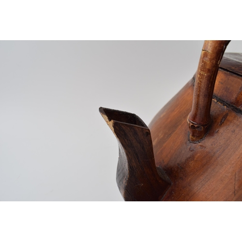 175 - Large vintage Chinese tea kettle in wood with bamboo handle. A good decorative item. Width 37cm, Hei... 