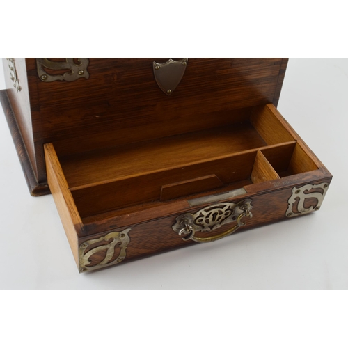 210 - Victorian oak stationery box with pull out drawer, revealing letter rack, with metal fixings and han... 