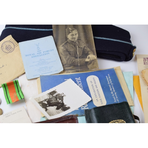 389 - A collection of military items relating to SGT Johnson of the Royal Signals Corps, 2345385 b 01/08/1... 