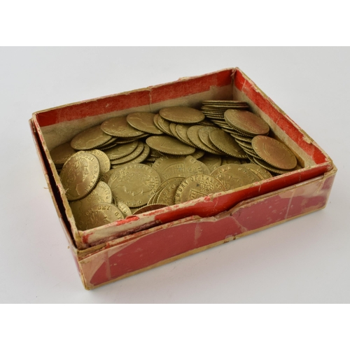 392 - Box of 145 brass spade half-guinea gaming counters. In original box.