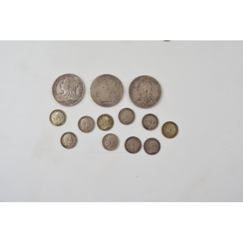 397 - A quantity of UK silver coinage. To include 54g of 1920 - 1947 coins and 55g of pre 1920 coinage. Of... 