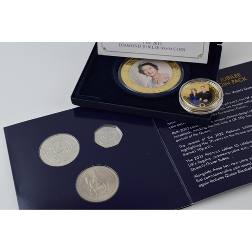 402 - Commemorative coins to include boxed Diamond Jubilee Five Dollar Coin, a Platinum Jubilee 3 coin set... 