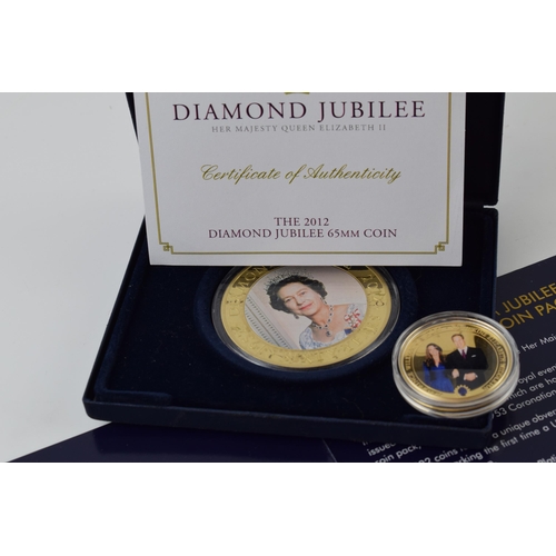 402 - Commemorative coins to include boxed Diamond Jubilee Five Dollar Coin, a Platinum Jubilee 3 coin set... 