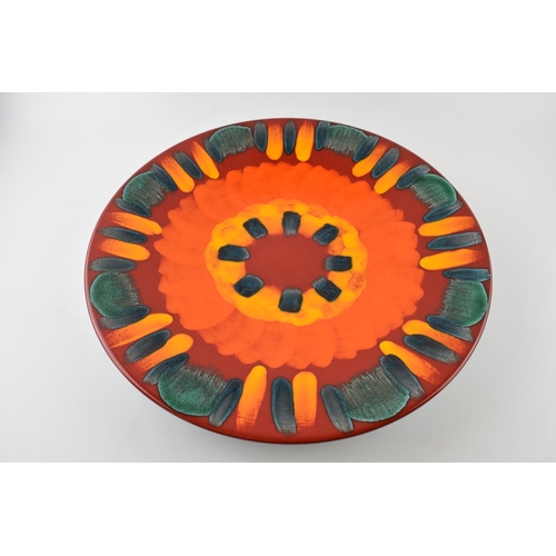 69 - Large Poole Pottery charger in the Volcano pattern, 41.5cm diameter.