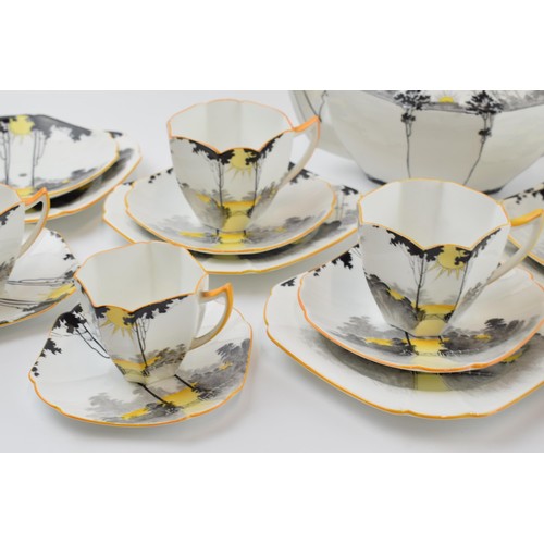 150 - A collection of Shelley tea ware to include 11479 Sunset and Trees teapot (cracked), a quantity of 1... 