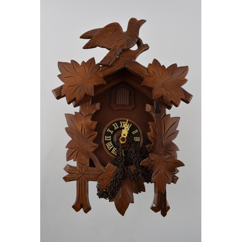 271 - 20th century bavarian / black forest style cuckoo clock with weights, untested, 32cm tall.