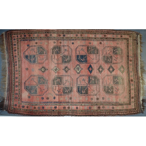 182 - Early 20th century Hand-knotted Afgan carpet. In pinks, browns, creams and blacks. Natural colour di... 