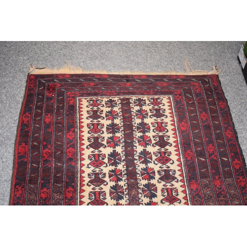 184 - Pakistan Bokhara carpet. Hand-knotted In pinks, black / browns and creams. Natural colour died wool.... 