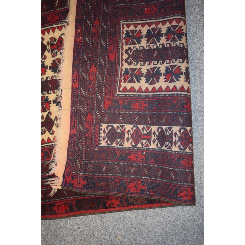 184 - Pakistan Bokhara carpet. Hand-knotted In pinks, black / browns and creams. Natural colour died wool.... 