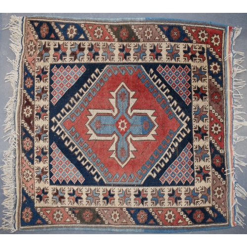 185A - Vintage Turkish hand-knotted carpet with traditional pattern in reds, blues, creams and browns, 109x... 