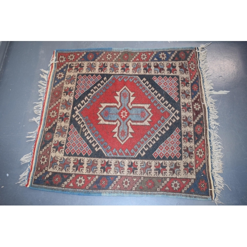 185A - Vintage Turkish hand-knotted carpet with traditional pattern in reds, blues, creams and browns, 109x... 