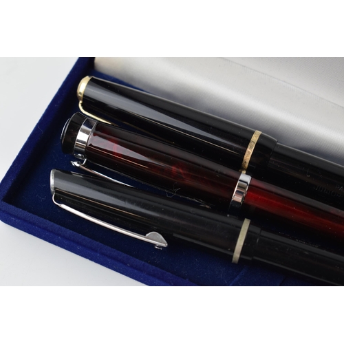 203 - A collection of vintage and modern fountain pens to include Parker Duofold Junior fountain pen with ... 