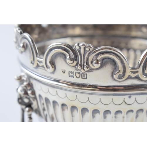 439 - Hallmarked silver table centrepiece / fruit bowl with drop down handles in the form of lions, London... 