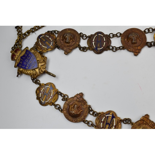 302 - Masonic Interest: a Masonic regalia / chain collar with a quantity of enamel, gilt metal and metal b... 