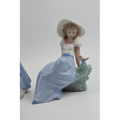 103 - Nao by Lladro to include girl sitting with straw hat, a girl with a puppy, girl with a bird and a gi... 