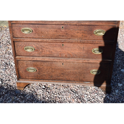 220 - Georgian oak secretaire / chest of drawers with ornate brass handles, 99x55x104cm tall.