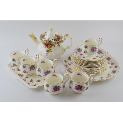 166 - Royal Albert tea ware to include an Old Country Roses teapot with a set of 6 trios in the Violetta p... 